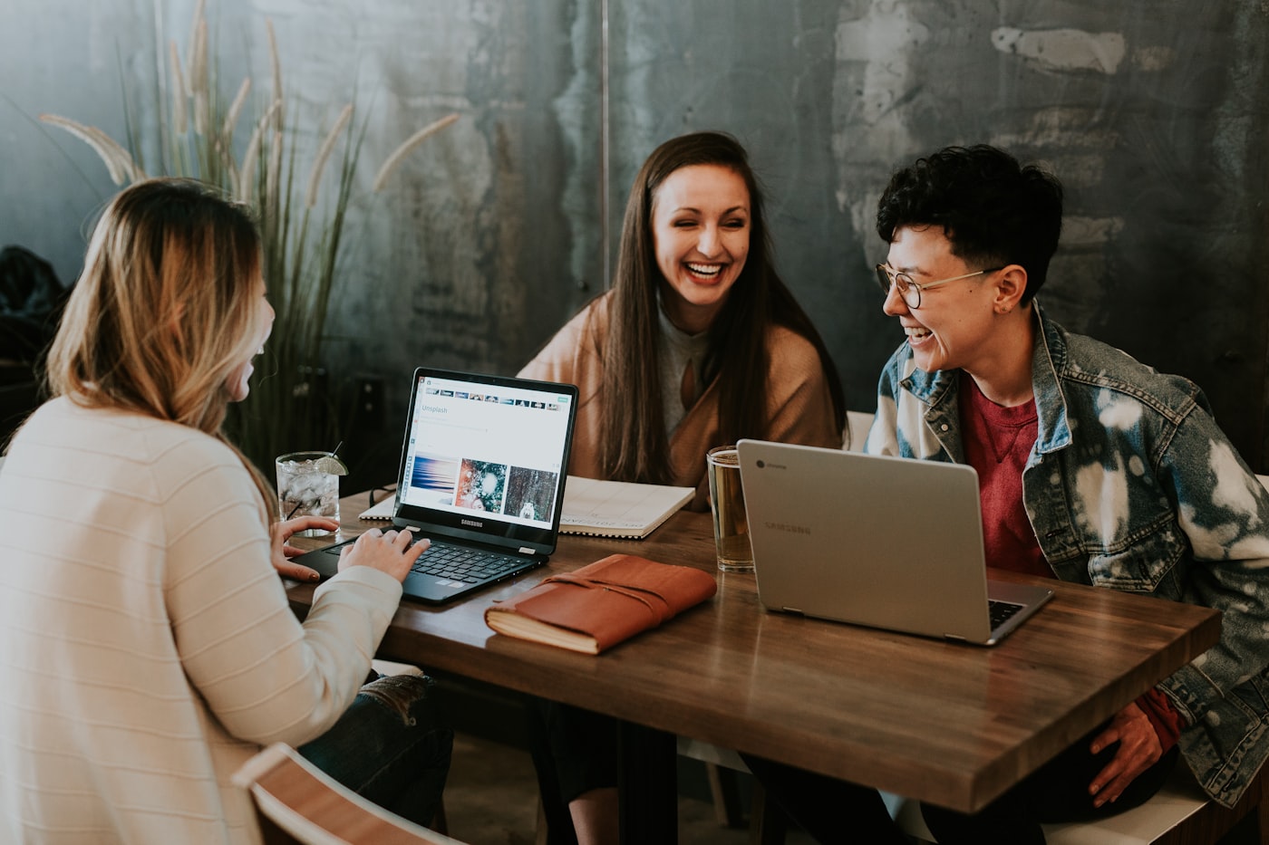 Diverse group of people using different devices and assistive technologies to access the same web application