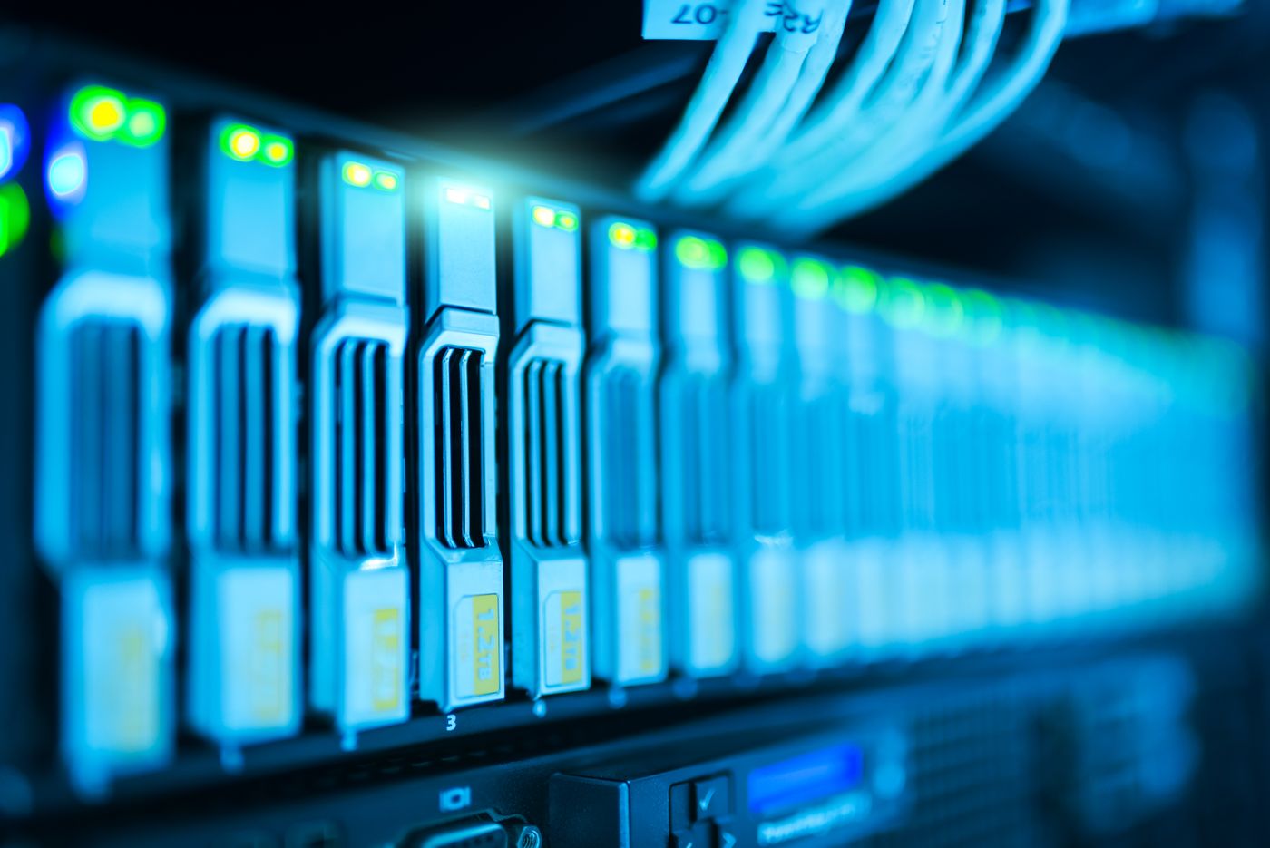 Multiple servers in a data centre representing horizontal scaling of a web application